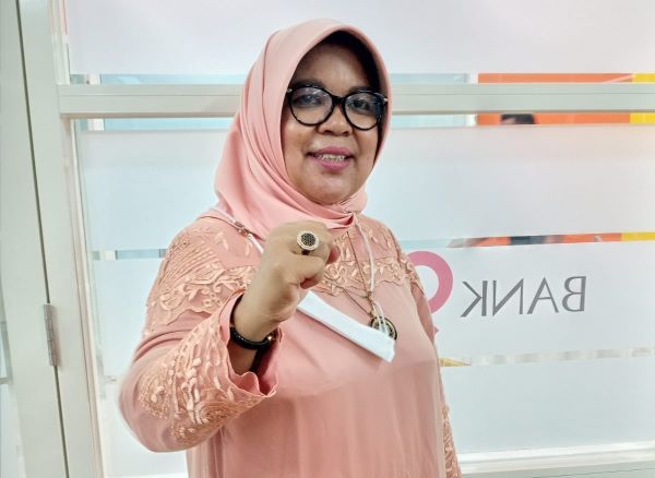 Direktur Kepatuhan Bank Jambi Hj. Riza Roziani, S.E.